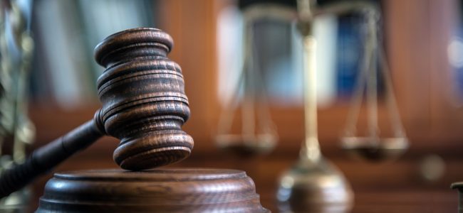 Law and Justice concept. Mallet of the judge, books, scales of justice.