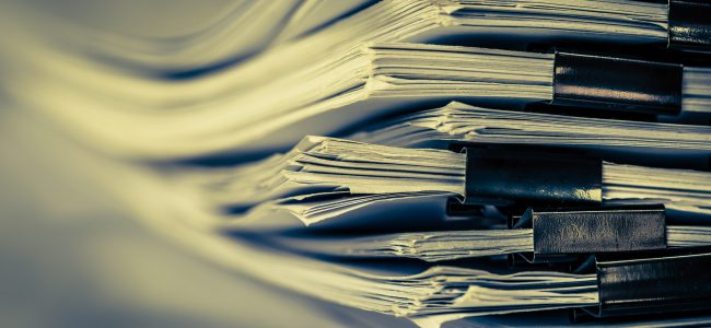 documents; stack of documents; exhibits; binder clips