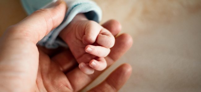baby hand; medical leave; parental leave
